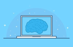 Laptop con la imagen de un cerebro de fondo